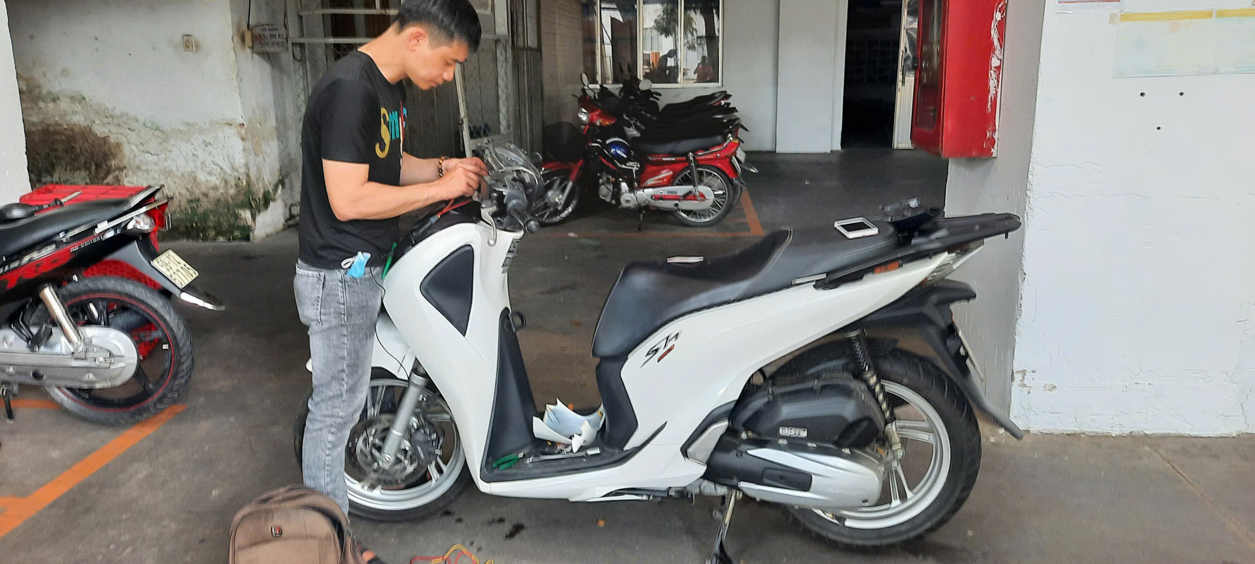 lap định vị xe máy tại dĩ an